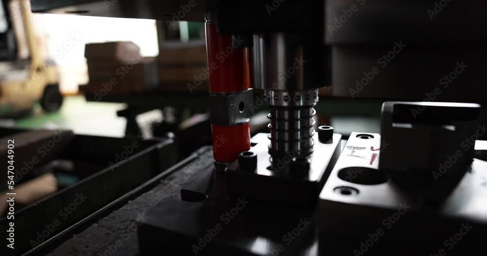 Sheet Metal Stamping Tool Die for Automotive Precision Parts on The Numerical Control Milling Machine Table. Tandem Stamping System. At a High Quality Technology Factory. Slow motion 4K video.