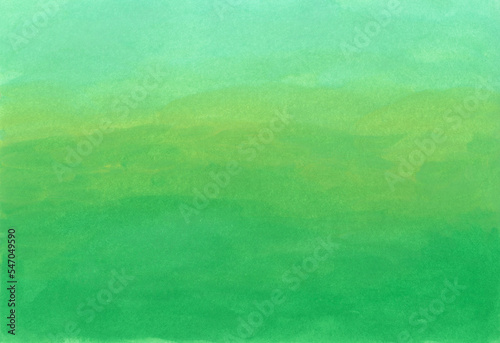 絵の具で描いたグリーン、水色のグラデーションの背景素材