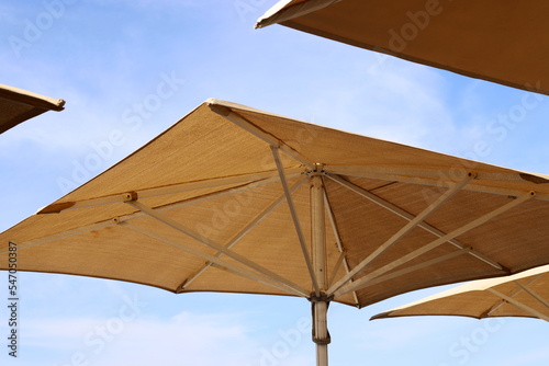 Umbrella in the city park near the sea.