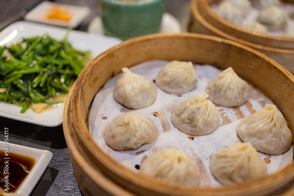 Fototapeta premium Chinese style steamed soup bun in restaurant