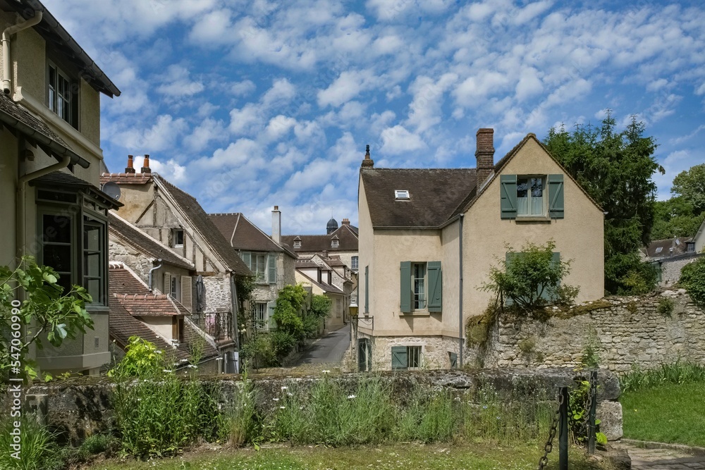 Senlis, medieval city in France, typical houses on the ramparts
