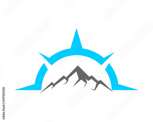 Half compass with mountain inside