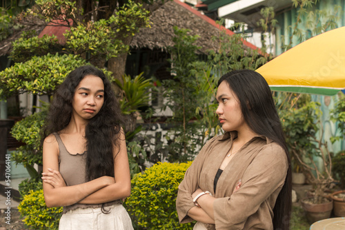 Photography Two women not on speaking terms, mad at each other after an argument