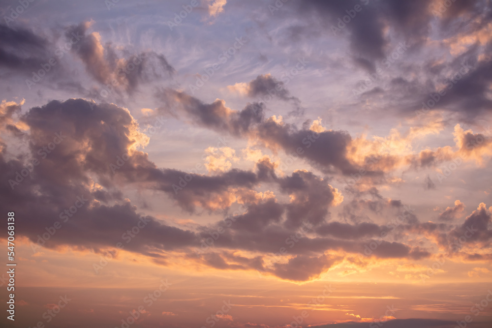 Obraz premium Colorful clouds at sunset as background.