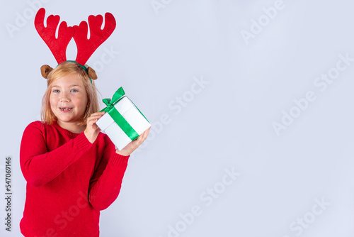 Christmas holiday background with funny girl