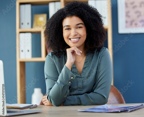 Business, woman and portrait of lawyer or legal advocate at her desk in the office ready for a case. Attorney, front and african American businesswoman proud of her management law firm workplace