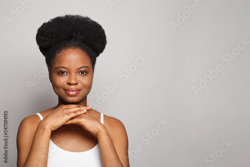 Beauty face of the young beautiful smiling woman on white banner background