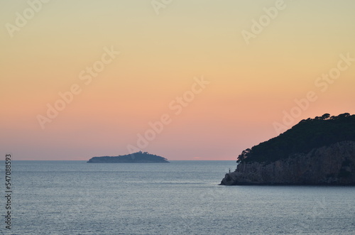 Sun is gone Dawn at Sea mountain silhouette colorfull Ocean Horizon © Andreas