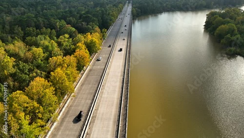 Drone footage of driving cars on the bridge over West Lake Houston in Kingwood, TX US photo