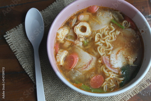 seblak Made from wet ground crackers consisting of garlic and kencur.  Wet crackers are cooked with fine spices consisting of garlic, kencur, and chili sauce. photo