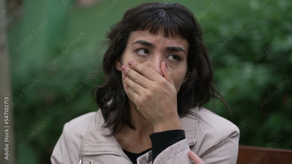 A sad hispanic woman having the support of empathic friend. Two latin women hugging each other in community A sad hispanic woman having the support of empathic friend. Two latin women hugging each other in community