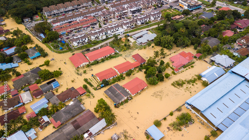 Aerial view of Dengkil district from flooding that causes damage of the infrastructure and housing area. Selective focus, contains dust and grain