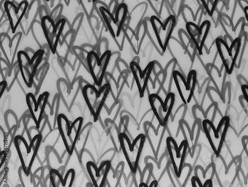 Hearts graffiti, heart pattern, creative background in black and white.