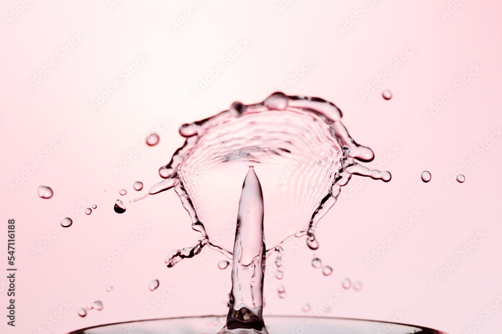 Fototapeta premium Water Drop Splash with Ripples on water surface