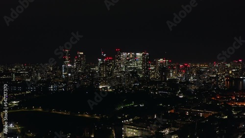 Wallpaper Mural Night panoramic view of London, the largest city in England, and its financial center Canary Wharf with shining high buildings, aerial shot. Torontodigital.ca