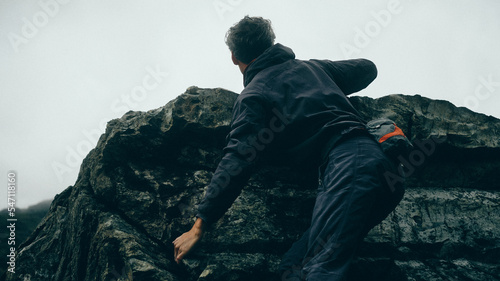 climber standing on a rock