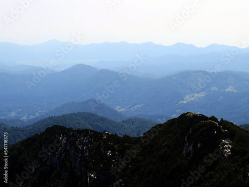 View of distant hills and mountain forests of Gorski Kotar from Risnjak National Park, Croatia (Pogled na udaljene brijegove i planinske šume Gorskog kotara iz nacionalnog parka Risnjak - Gorski kotar photo