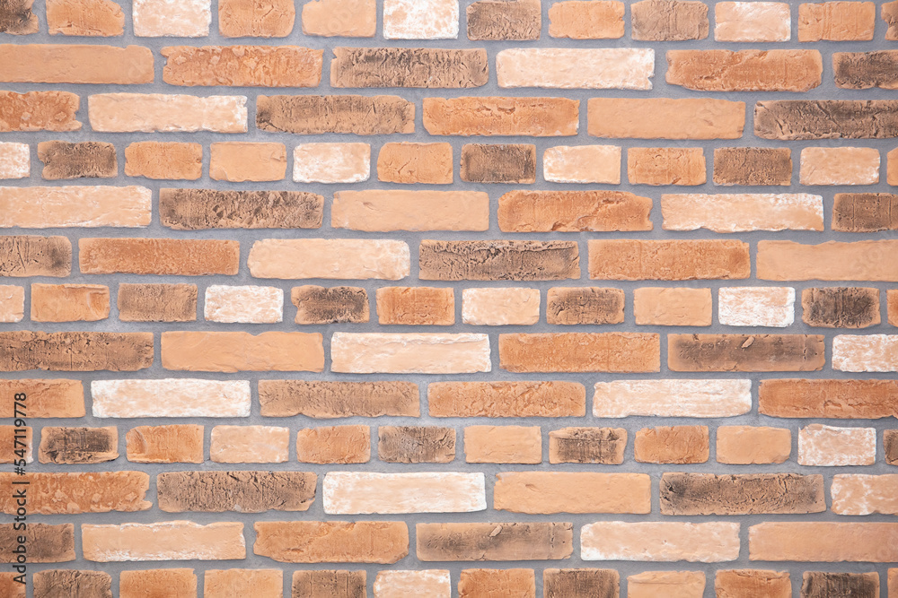 Brown brick wall texture. Close - up of brown brickwork. Brown brick wall texture. Close - up of brown brickwork.