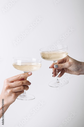 Cheers. Prosecco or white wine in beautiful glasses