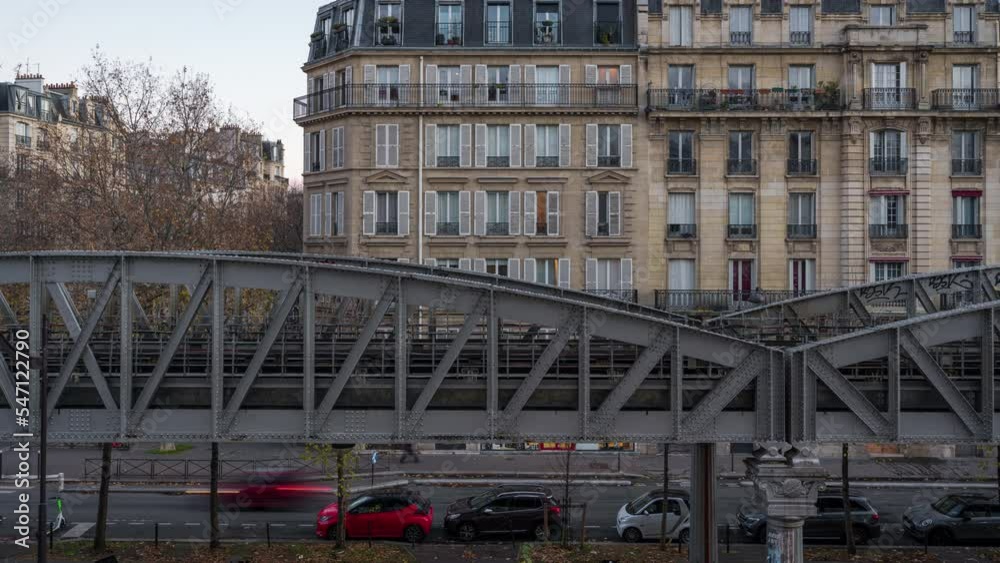 Metro Trains passing old houses at Boulevard Garibaldi in Paris, France Metro Trains passing old houses at Boulevard Garibaldi in Paris, France