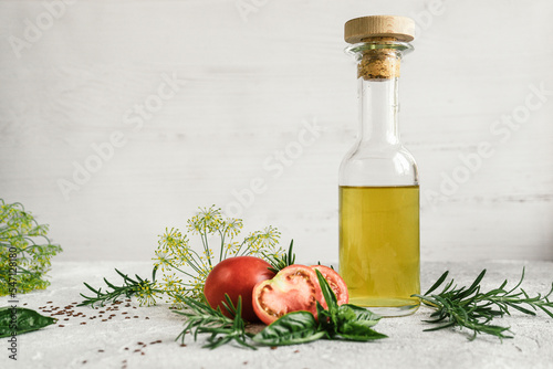 Fototapeta Naklejka Na Ścianę i Meble -  fresh vegetable oil from spicy aromatic herbs for salad dressing and tomatoes 5