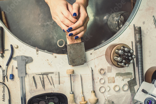 Close up jewelry maker tools concept photo. Craftsmanship. Work space. Top view photography with work table on background. High quality picture for wallpaper, travel blog, magazine, article