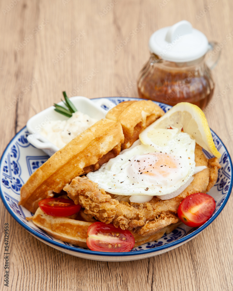 Waffle sandwich with fried chicken and egg Waffle sandwich with fried chicken and egg