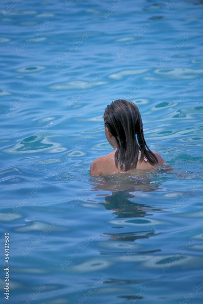 Woman in the pool.