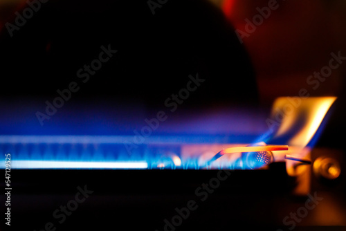 Gas boiler igniter. Gas is burning in the boiler.