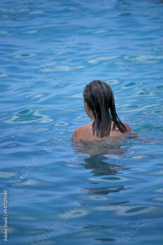 Woman in the pool.