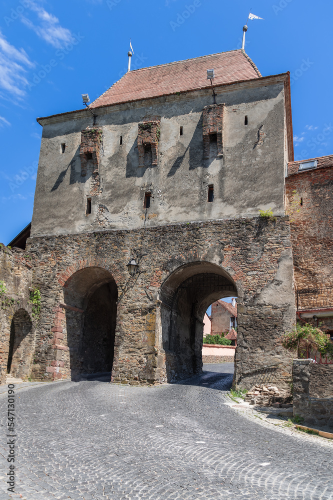 Tailors Tower (Turnul Croitorilor) is one of the most beautiful and impressive towers of Sighisoara fortress due to its massiveness and simplicity. Romania (vertical shot)