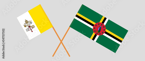 Crossed flags of Vatican and Dominica. Official colors. Correct proportion