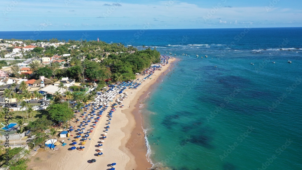 Panoramic view of a beautiful white sand beach with turquoise waters of the Atlantic Ocean in Salvador, capital of Bahia State, Brazil 