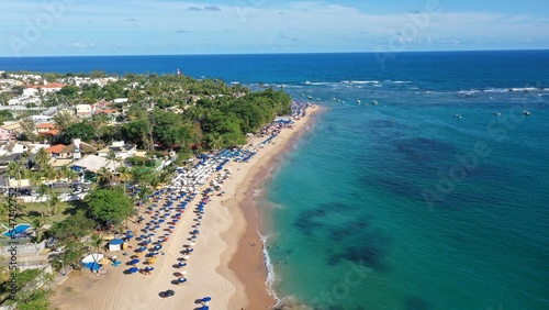 Panoramic view of a beautiful white sand beach with turquoise waters of the Atlantic Ocean in Salvador  capital of Bahia State  Brazil 