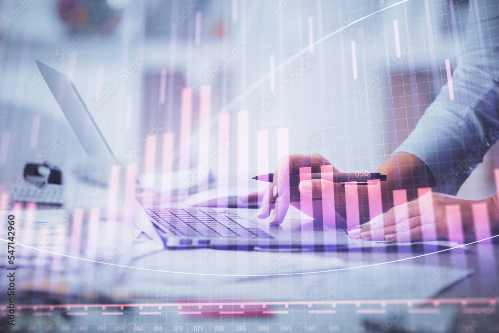 Double exposure of woman hands typing on computer and forex chart hologram drawing. Stock market invest concept.