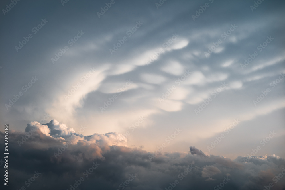 Amazing high altitude clouds during sunset after a summer storm Amazing high altitude clouds during sunset after a summer storm