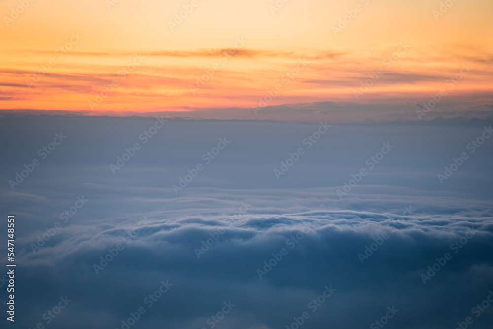 Low altitude clouds above the Pianura Padana a few minutes after sunset, Northern Italy