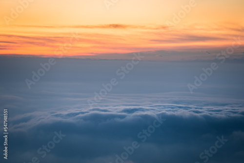 Low altitude clouds above the Pianura Padana a few minutes after sunset, Northern Italy