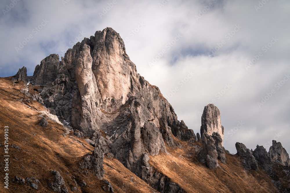 Sharp rock formations in the mountains near Lake Como  during an autumnal day