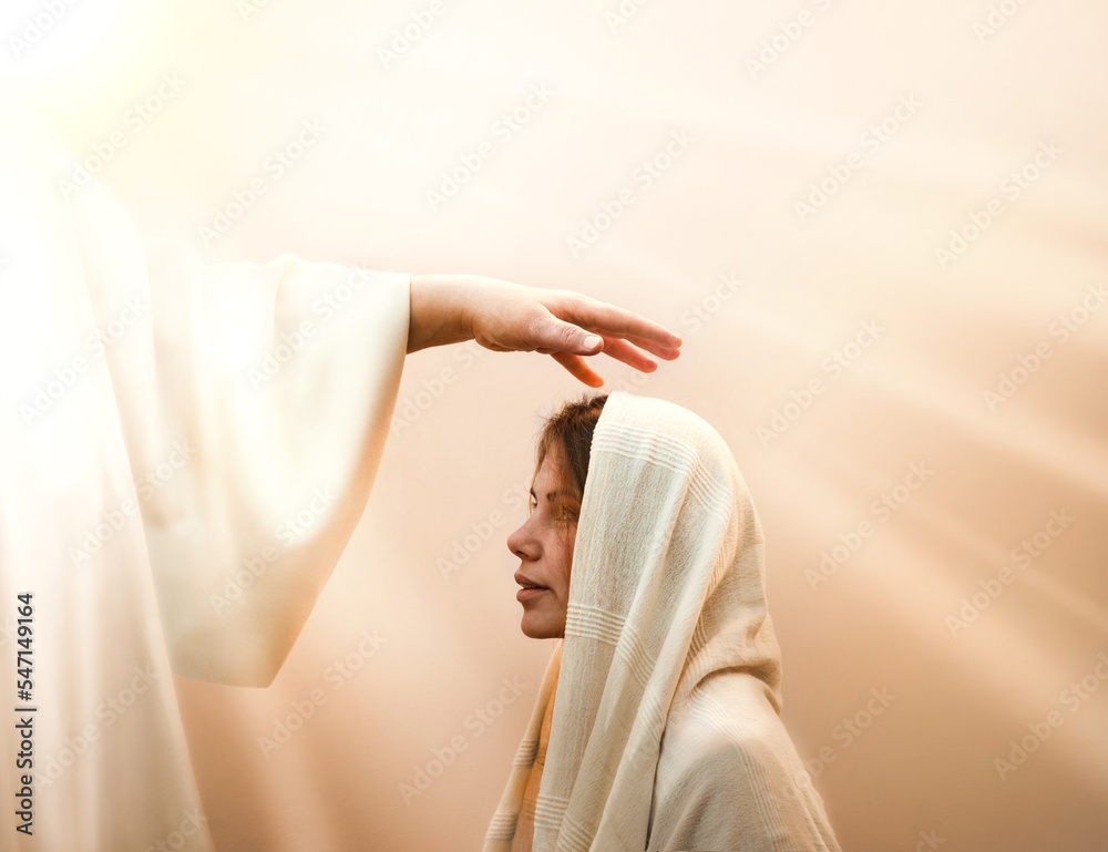 Blessing hand above the head of a woman in a headscarf - obrazy, fototapety, plakaty 