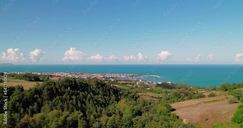Aerial shot of a quaint town in the Black Sea. Wide angle shot of a sea town with a drone. Gerze, Sinop, Turkey Aerial shot of a quaint town in the Black Sea. Wide angle shot of a sea town with a drone. Gerze, Sinop, Turkey
