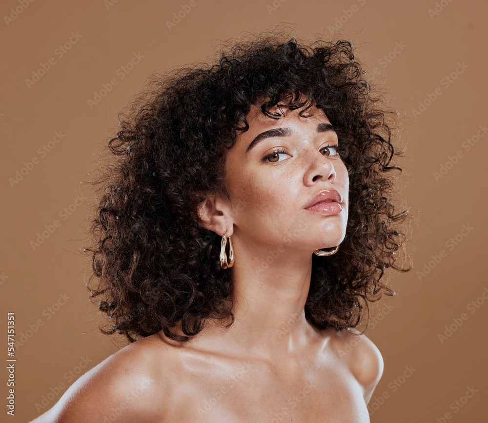 Black woman, beauty and skincare face portrait for natural afro, facial or hair care cosmetics. Healthy, beautiful and assertive model with curly hair shine and texture in brown studio background. - obrazy, fototapety, plakaty 