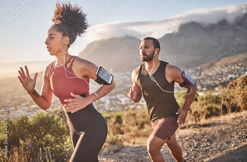 Fototapeta Naklejka Na Ścianę i Meble -  Fitness, exercise and black couple running for cardio health on mountain road for speed, energy and wellness. Man and woman runner listen to music outdoor for workout and training for marathon race