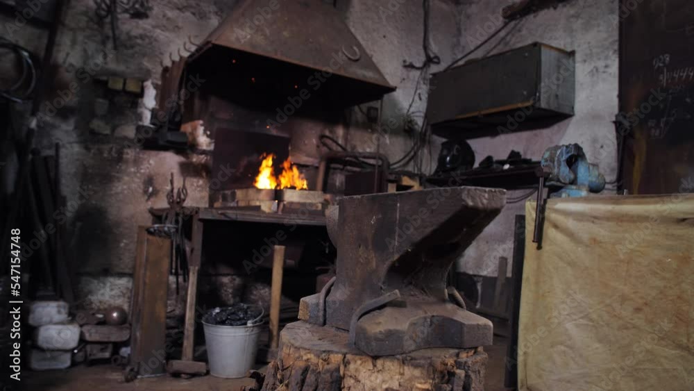 Burning coal in the forge of the blacksmith shop. The general plan of the blacksmith shop. Burning coal in the forge of the blacksmith shop. The general plan of the blacksmith shop.
