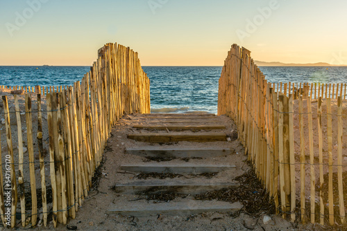 Scenic view of wooden stair entrance to beach in south of France