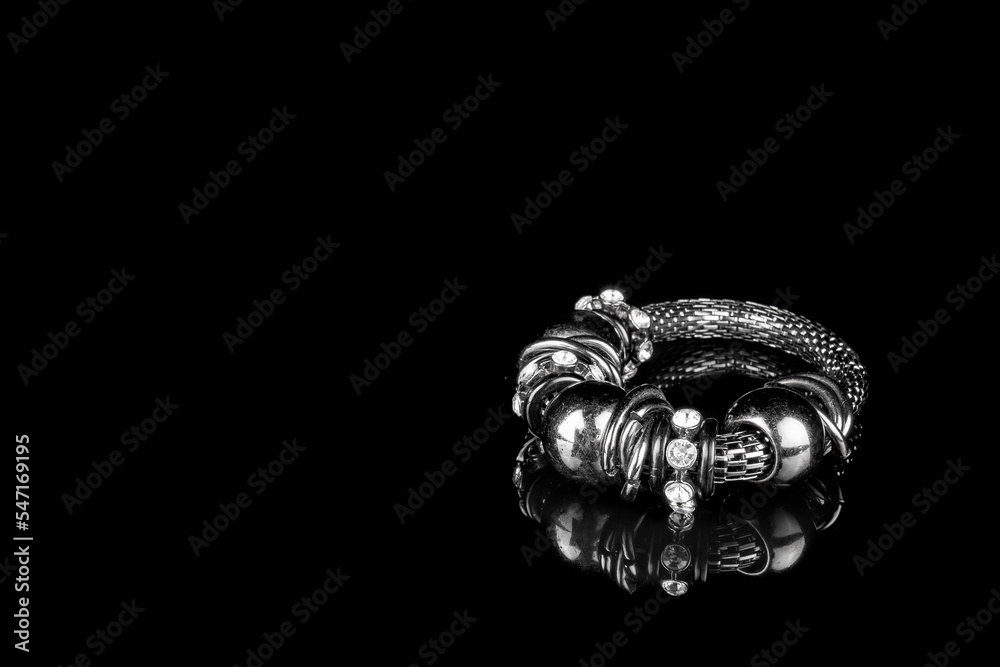 abstract black bracelet on dark background texture abstract black bracelet on dark background texture