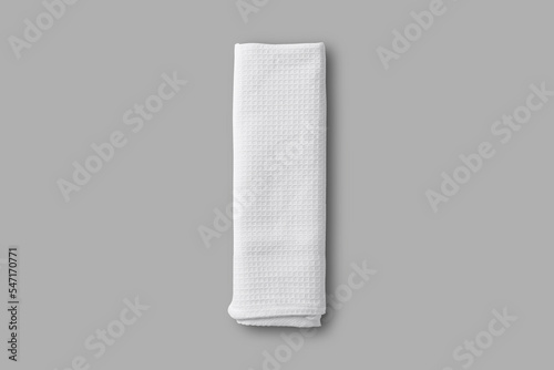 Empty blank white folded material dishcloth  mockup isolated on a grey background. 3d rendering. photo