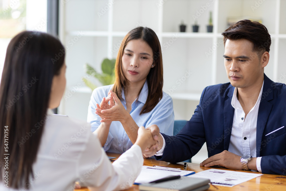 Handshake, manager is interviewing a new employee for a job. Collaboration of colleagues in the organization. Handshake, manager is interviewing a new employee for a job. Collaboration of colleagues in the organization.