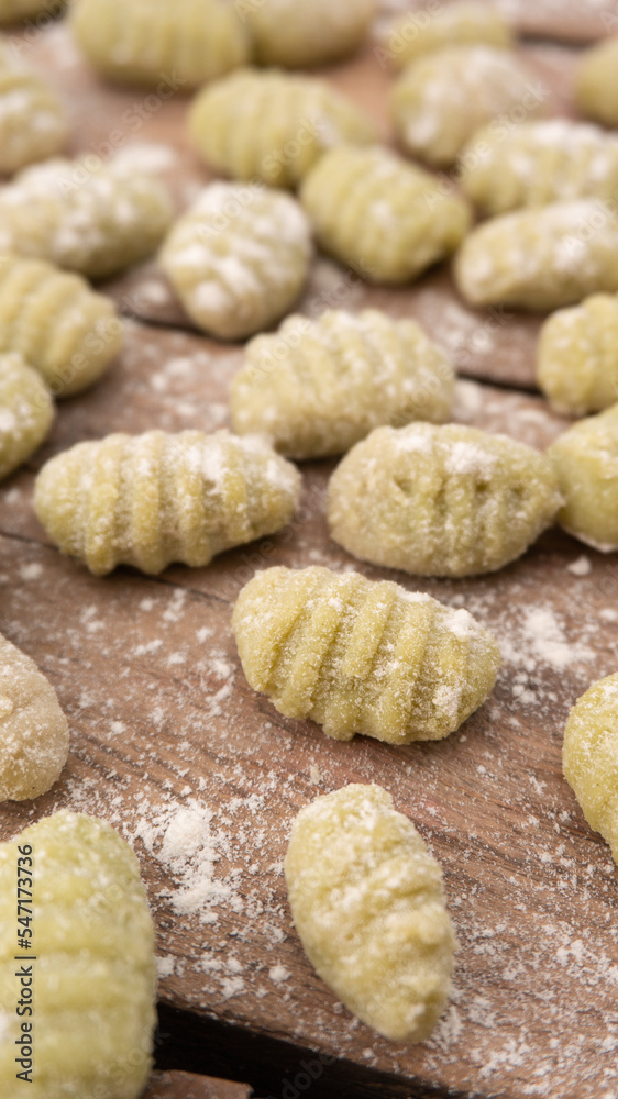 close up of Spinach gnocchi with flour close up of Spinach gnocchi with flour