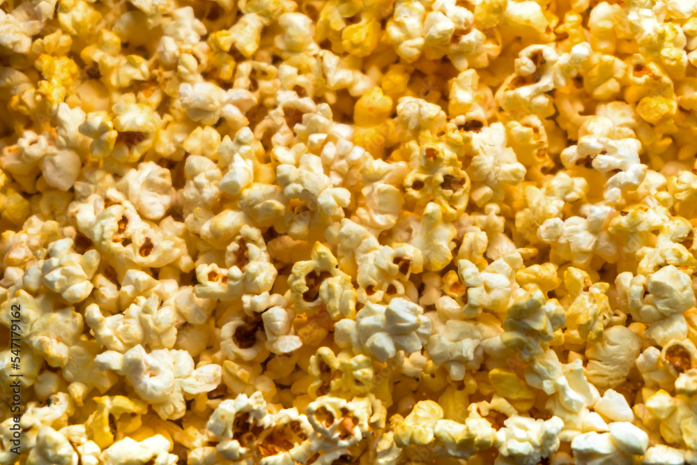 Golden caramel popcorn closeup background Golden caramel popcorn closeup background